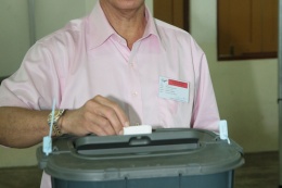 President Michel voting in the National Assembly Elections 2011